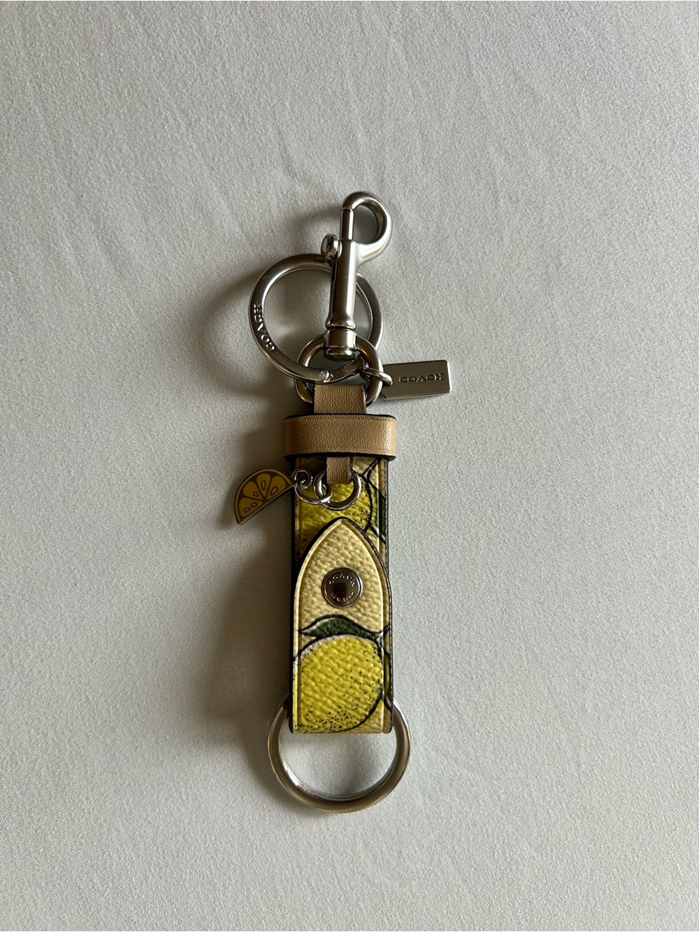Coach Trigger Snap Lemon Leather Keychain Charm